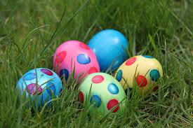 Colorful Easter eggs in grass