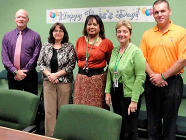 Employees celebrating bosses day in October 2011.