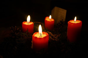 Four candles burning