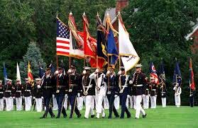 Marines, Air force, Navy, Army soldiers standing at attention