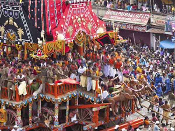 Rath Yatra Puri Rath Yatra chariot carrying Subhadra, Balabhadra and Jagannath deities to Jagannth Temple.