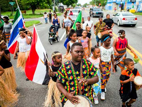 Children marching in Juneteeth parade.