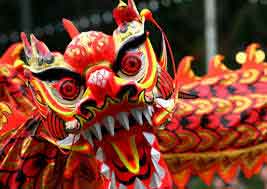 Giant dragon costume in parade celebration