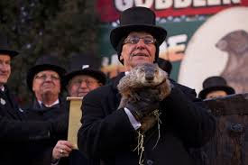 Gentleman holding groundhog