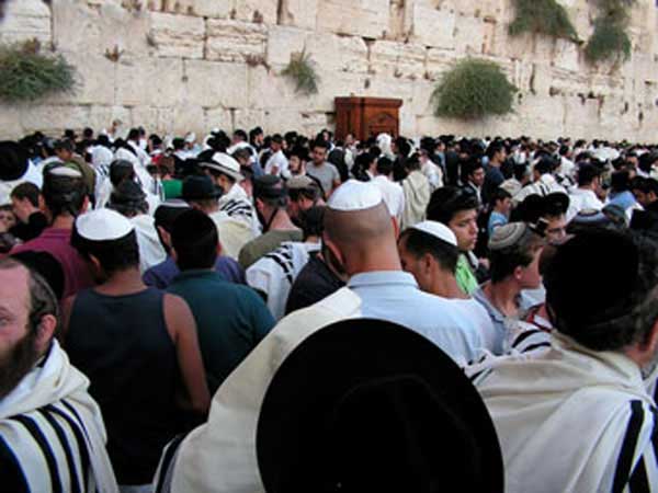 Jews praying at the Western wall in Jerusalem.