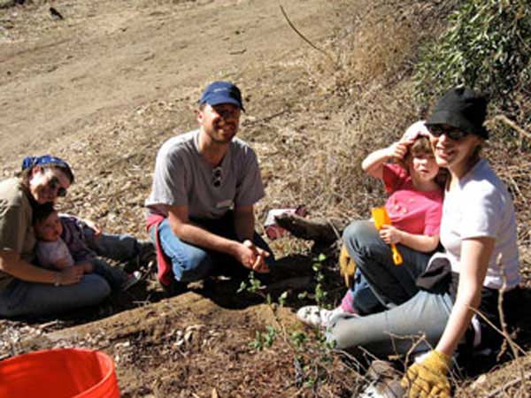 Tu B'Shevat Family planting tree in Runyon Canyon.
