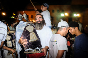 Jews celebrating in the streets with the sacred scrolls - Simchat Torah Jews celebrating in the streets with the sacred scrolls
